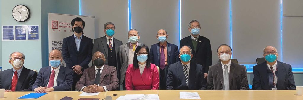 Chinese Hospital 2020 Board Installation seated at a conference room table