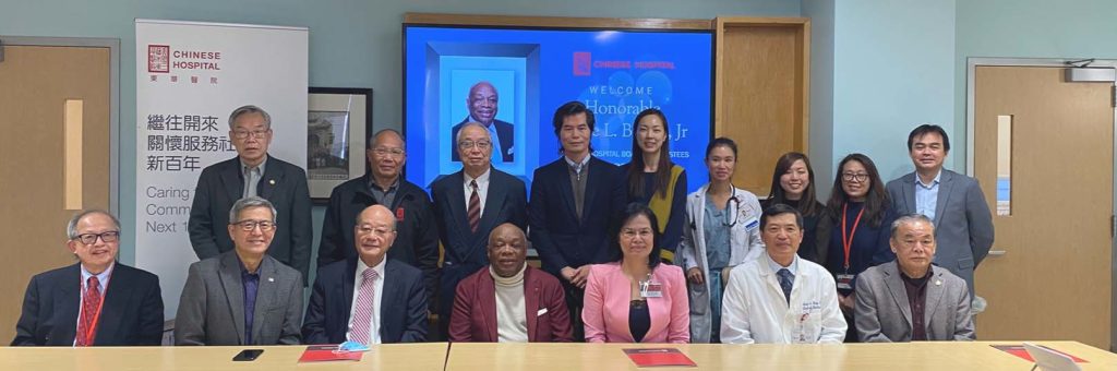 Willie Brown Joins Chinese Hospital and is seated at the boardroom table